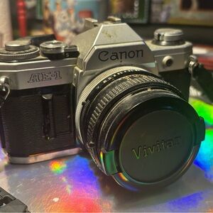 Canon AE-1 Camera with Black and Silver Design